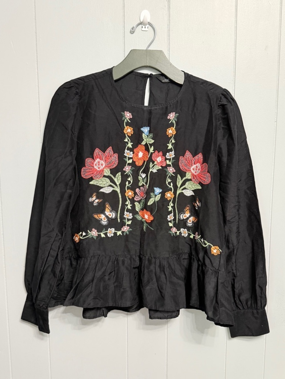 #10)  Zara Black Peplum Blouse with Colorful Floral Embroidery